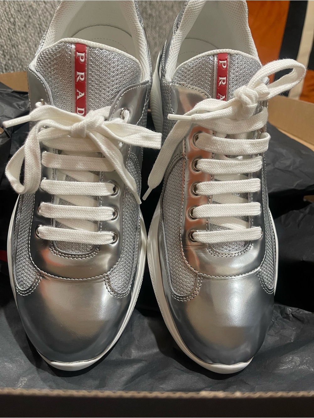 Prada Men’s Silver and White Sneakers with Red Logo Tab